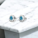 Cushion Cut Blue Topaz and White Enamel Stud Earrings in 925 Sterling Silver
