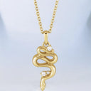 Diamond Accented Serpent Pendant in 14kt Yellow Gold