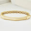 Brazalete tipo brazalete con bisagras geométricas en oro amarillo de 14 kt