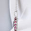 Oval Amethyst and Rhodolite Garnet Halo Pendant in 925 Sterling Silver