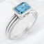 Anillo con topacio azul cielo de talla esmeralda en plata de ley 925