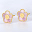 Aretes con forma de flor de nácar rosa en oro amarillo de 14 kt