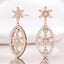 Aretes colgantes con forma de flor y diamantes redondos de 0,52 quilates en oro rosa de 18 quilates