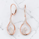 0.45 ctw Round Diamond Swirl Dangle Earrings in 14kt Rose Gold