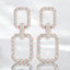 Aretes colgantes con eslabones rectangulares y diamantes redondos de 2,06 quilates en oro rosado de 18 quilates