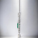 Emerald Cut Emerald and Diamond Pendant in Platinum