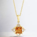 Colgante de citrino y diamantes en oro amarillo de 14 kt