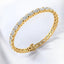 Brazalete de tenis con diamantes cultivados en laboratorio ovalados horizontales en oro amarillo de 14 kt