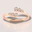 0.12 ctw Bezel Set Round Lab Grown Diamond Bypass Ring in 14kt Rose Gold