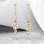 1.30 ctw Oval and Pear Shaped Lab Grown Diamond Drop Earrings in 14kt Rose Gold