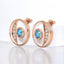 Round Blue Topaz and Lab Grown Diamond Stud Earrings in 18kt Rose Gold Plated 925 Sterling Silver