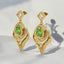 3.50 ctw Pear Shaped Peridot and Lab Grown Diamond Earrings