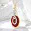 Oval Garnet And Red Enamel Pendant in 18kt Yellow Gold Plated 925 Sterling Silver