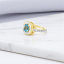 Cushion Cut Blue Topaz and White Enamel Ring in 22kt Yellow Gold Plated 925 Sterling Silver