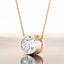 Oval Bezel Set Lab Grown Diamond Solitaire Pendant in 14kt Rose Gold