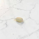 0.62 Carat Oval Cabochon Ethiopian Opal Gemstone