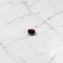 0.61 Carat Oval Rhodolite Garnet Gemstone