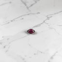 0.61 Carat Oval Rhodolite Garnet Gemstone