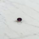 0.62 Carat Oval Rhodolite Garnet Gemstone
