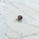 0.62 Carat Oval Rhodolite Garnet Gemstone