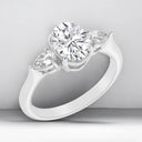 2.50 ctw Oval and Pear Shaped Lab Grown Diamond Three-Stone Engagement Ring in 14kt White Gold