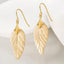 Mother of Pearl Leaf Dangle Earrings in 14kt Yellow Gold