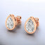 Aretes con diamantes cultivados en laboratorio en forma de pera y engarce de bisel en oro rosado de 14 kt