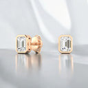 Bezel Set Emerald Cut Lab Grown Diamond Stud Earrings in 14kt Rose Gold