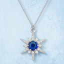 Blue Sapphire and Diamond Star Pendant in 14kt White Gold