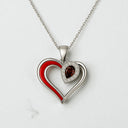 Pear Shaped Garnet and Lab Grown Diamond Heart Pendant in 925 Sterling Silver