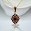 Oval Cabochon Garnet and Red Enamel Pendant in 18kt Yellow Gold Plated 925 Sterling Silver