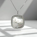 Carved Mother-of-Pearl and CZ Pendant in 925 Sterling Silver