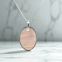 Oval Pink Mother-of-Pearl and CZ Pendant in 925 Sterling Silver