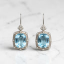Blue Topaz and Diamond Sandblasted Finish Dangle Earrings in 14kt White Gold