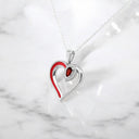 Pear Shaped Garnet and Lab Grown Diamond Heart Pendant in 925 Sterling Silver